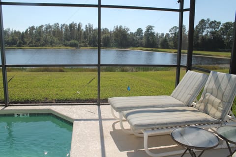 rest by the pool with a lake view!