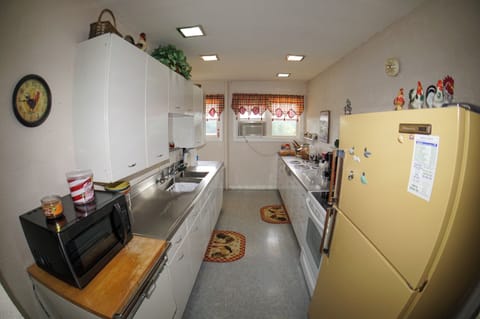 Kitchen - Upstairs kitchen with stove range/oven.