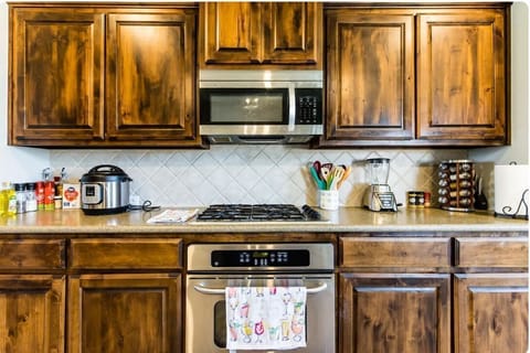 Large kitchen with stainless steel appliances