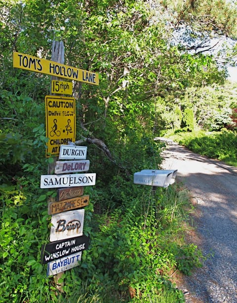 Old-fashioned signboard marks the entrance to our private lane