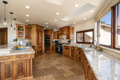 The kitchen offers high end appliances and everything you need to cook your favorite meals
