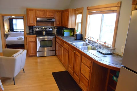 Fully equipped kitchen allows you to make meals in or just make a morning coffee