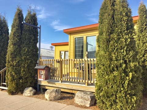 Large outdoor social area on this iconic Candy Store made cabin conversion.