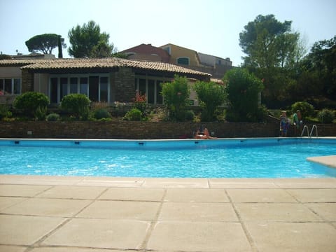 swimming pool only a few steps from the apartment