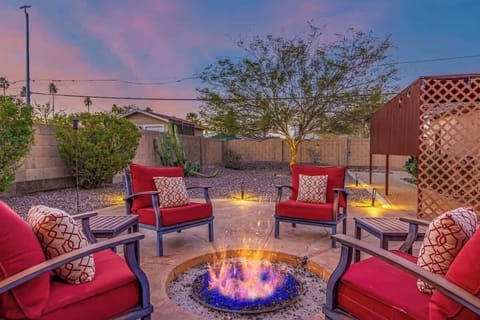 Private back yard with desert foilage and cozy fire pit!