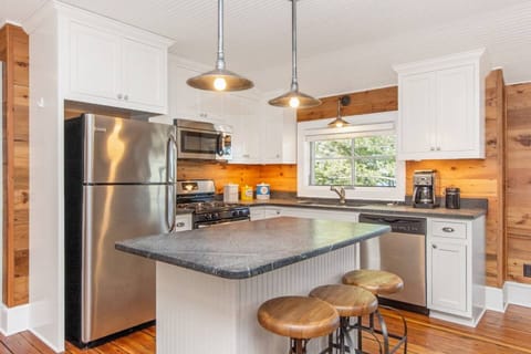 The upper apartment features its very own kitchen