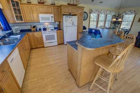 Top-Level Kitchen with Island seats 5 ** The high chair seen in photos is no longer at the property. If baby equipment is needed local rental options can be provided. **