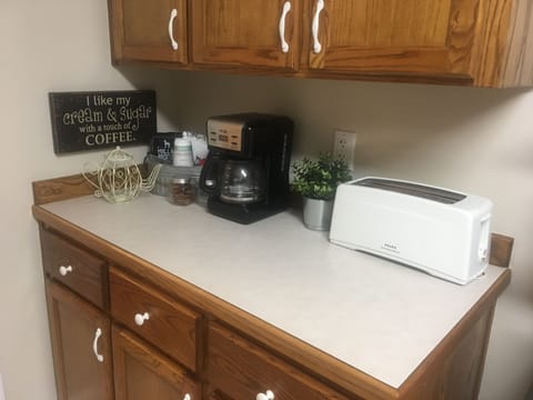 coffee, hot tea, filters, powdered creamer, sugar and artificial sweetener 