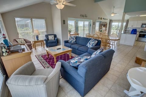 Top-Level Living Room with Deck Access ** The high chair seen in photos is no longer at the property. If baby equipment is needed local rental options can be provided. **
