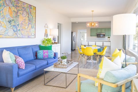 Living Room—The living room features a pull-out queen size sleeper sofa with a plush new gel-foam mattress, along with three comfortable easy chairs and large-screen TV.