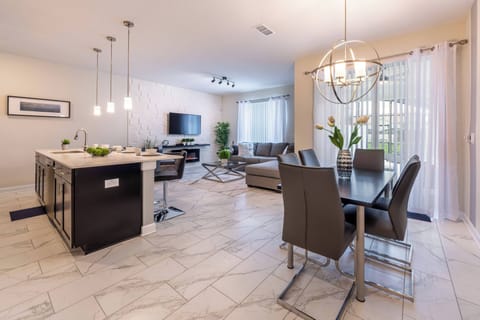 Dining area, kitchen and living room
