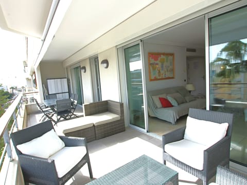 large terrace, lounge area and dining table