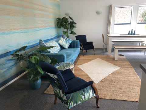 Newly renovated designer lounge & dining suite.