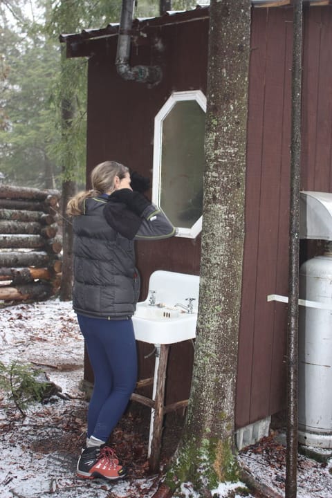 Outdoor sink, shower and outhouse for a bit of comfort