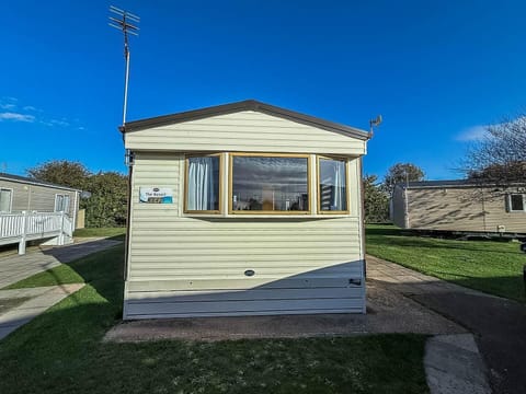 Cozy exterior with spacious yard for outdoor fun
