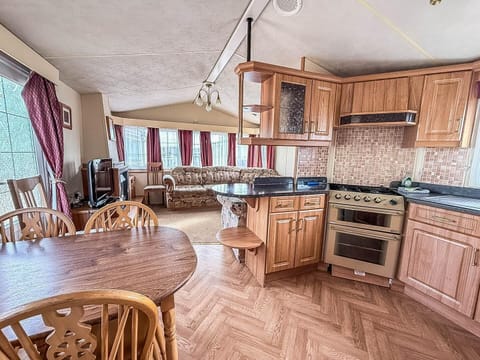 Cozy kitchen and dining area with warm wood accents