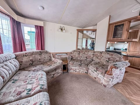 Cozy living room with plush sectional and natural light