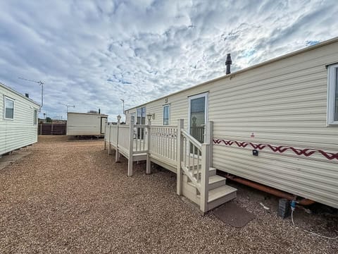 Cozy exterior with private deck for peaceful mornings