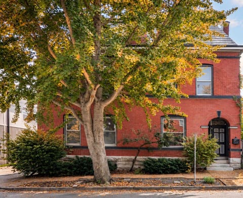A charming brick home with classic character, surrounded by the warm colors of fall in one of St. Louis’s historic neighborhoods. 🍂🏡 #FallInStLouis #HistoricHome #StLouisCharm