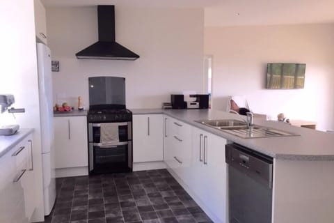 Kitchen with gas hobs and electric oven