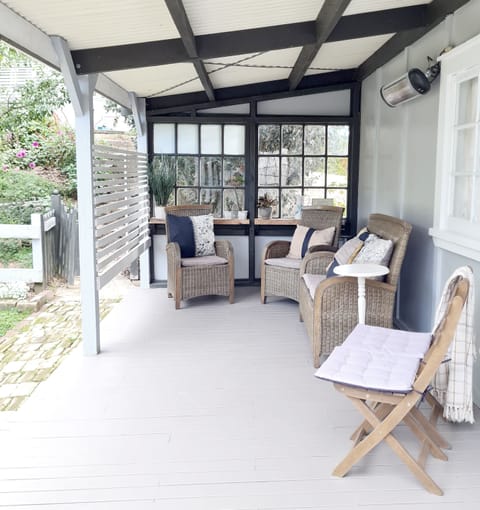 Sheltered verandah, comfortable seating and outdoor heating