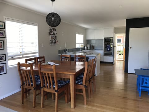 Main kitchen/dining area, opening onto deck 