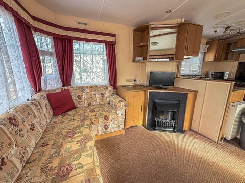 Cozy living area with plush seating and natural light