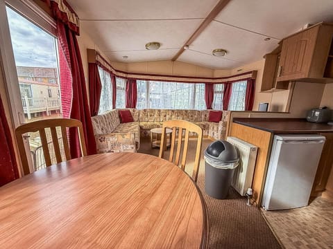 Cozy dining and lounge area with panoramic windows
