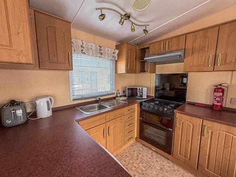Cozy kitchen with ample counter space and natural light