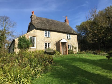 Front of cottage facing out over a sizeable lawn