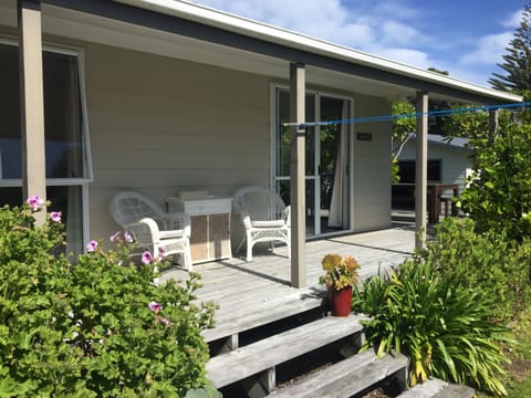 All weather veranda to relax with a coffee or a glass of wine  