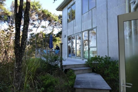 Back of house overlooking water
