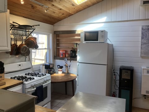 Sunny kitchen with two bright skylights.