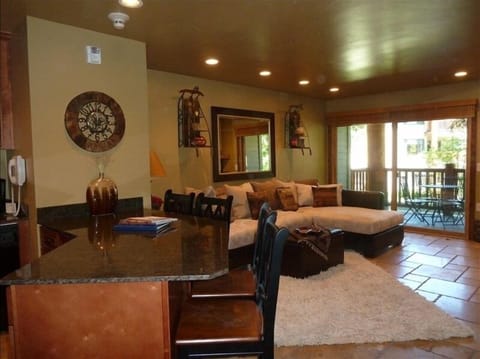 Completely remodeled with travertine flooring, new furniture & granite.