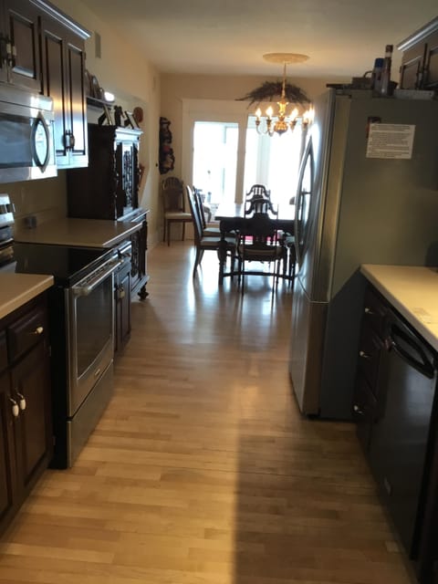 Looking from the kitchen into the dining room and then onto the 4 season porch