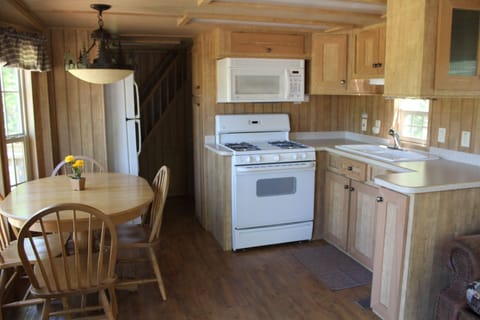 Fully equipped kitchen and dining area.