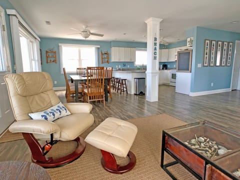 Open main floor - living room, dining and kitchen.