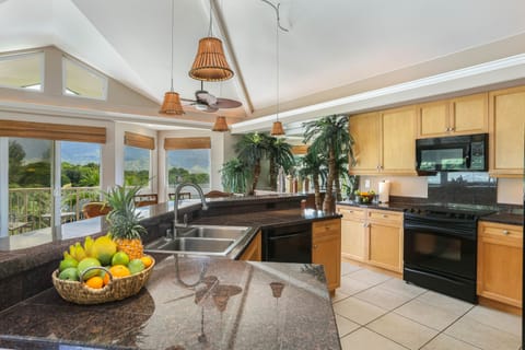 Fully equipped kitchen at Nohea Villa, perfect for preparing home-cooked meals.