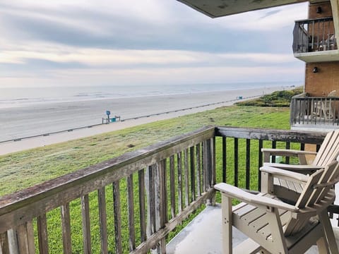 Step onto your private balcony and breathe in the ocean air while watching waves roll across the pristine beach below.