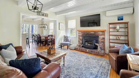 Living room with comfortable seating and large flat screen TV