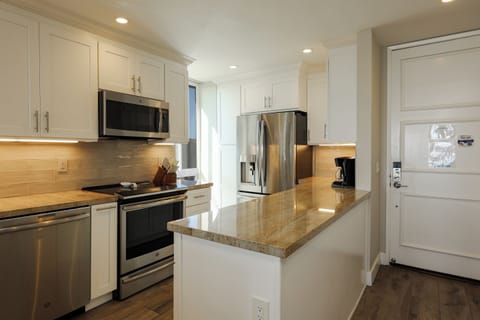 D14 kitchen - Remodeled kitchen is furnished with dinnerware, cookware, and of course a coffee maker