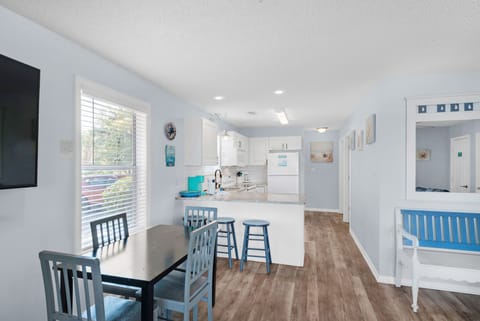 DIning table seats 4 and eat in kitchen bar seats 3