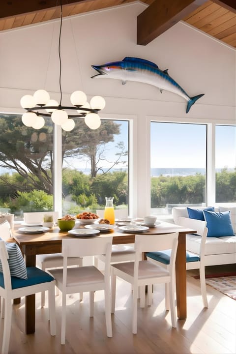 Bright dining area with ocean views and coastal charm
