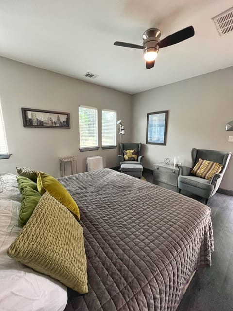 Bedroom with King bed and seating area