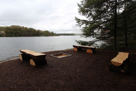 fire pit beside large boathouse