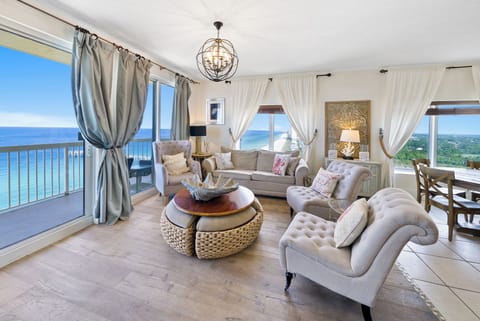 Sink into plush seating while breathtaking ocean views fill every window of your elegant living space.