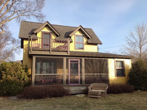 The amazing vistas can be enjoyed from the screened-in porch or upper deck.