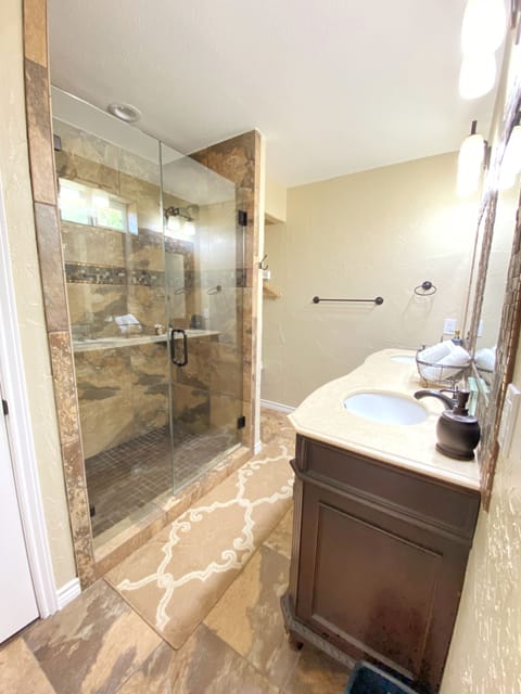 Primary Bathroom with Shower and Vanities
