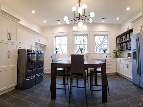 Kitchenette, refrigerator, toaster oven, hot plate, microwave, washer/dryer