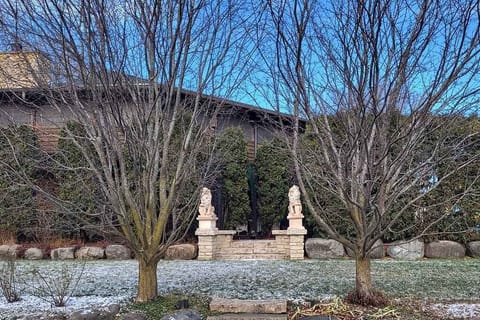 Two of the Four Lion Statues
